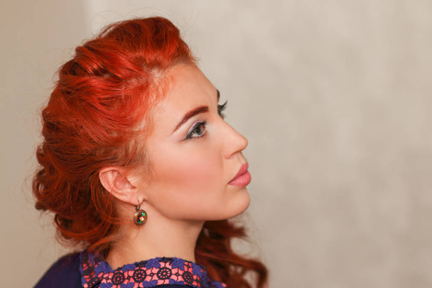 Pretty girl with subtle makeup and red hair in braided hairstyle - Фото, зображення