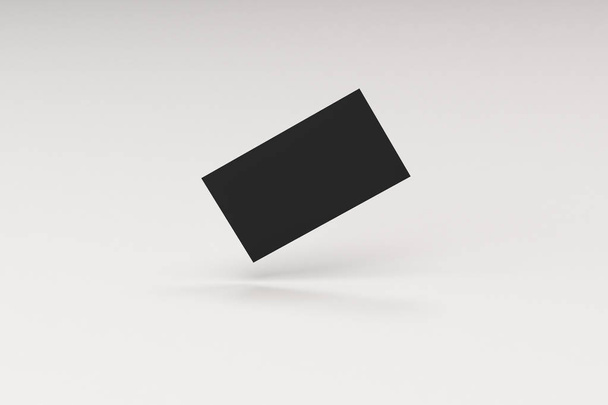 Black blank business cards mock-up on white background - Foto, afbeelding