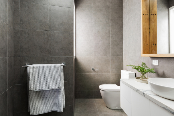 Charcoal grey bathroom with marble benctop  - Photo, Image