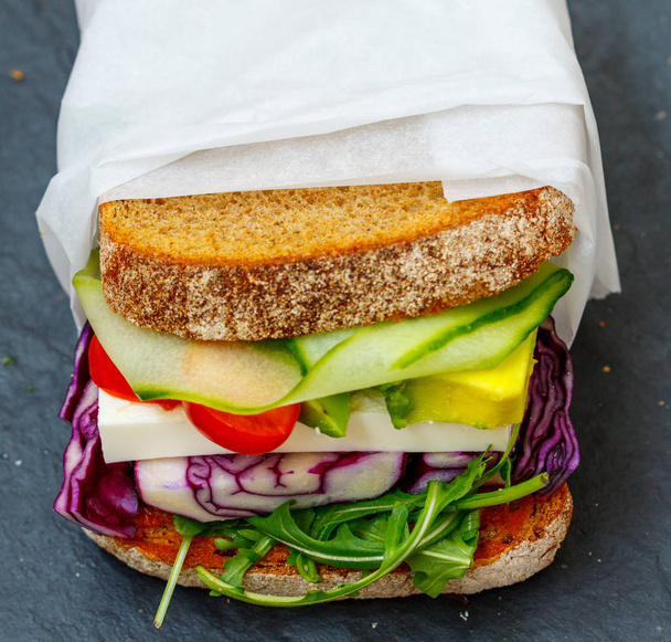 Two vegetarian sandwiches with feta cheese and vegetables - Foto, afbeelding