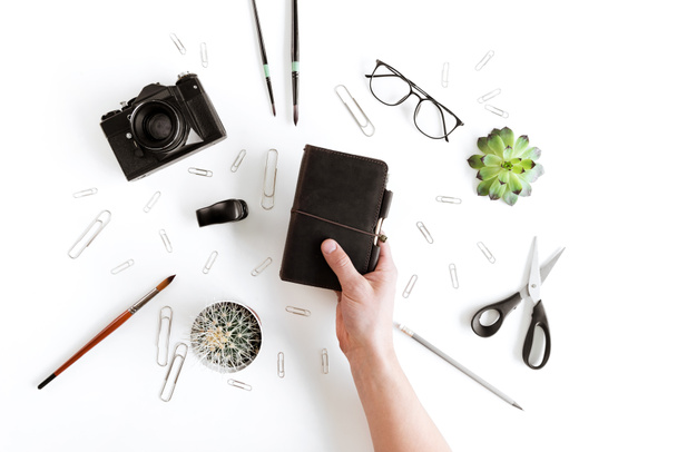Human hand and office supplies  - 写真・画像