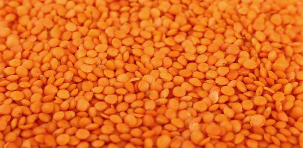 Orange lentil lens close up background - Φωτογραφία, εικόνα
