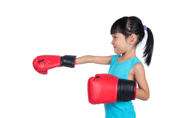 Asian Little Chinese Girl Wearing Boxing Gloves - Foto, afbeelding