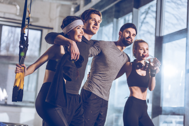 group of sportive people in gym - Photo, Image