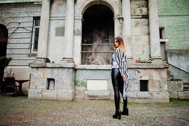 Fashionable woman look with black and white striped suit jacket, - Foto, imagen
