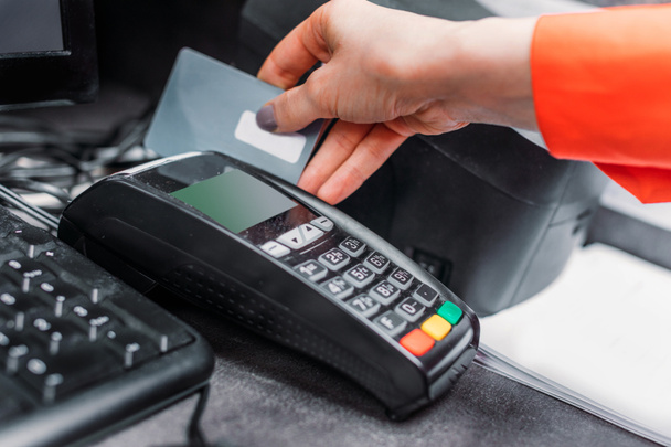 Person using payment terminal  - Photo, Image