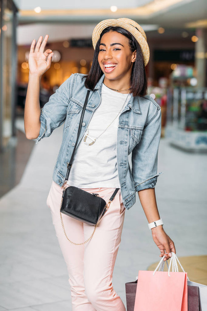 stylish woman with shopping bags - Zdjęcie, obraz