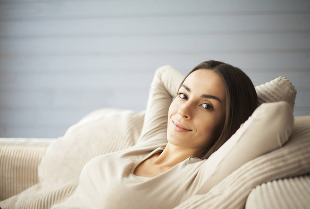 young woman relaxing at  home - 写真・画像