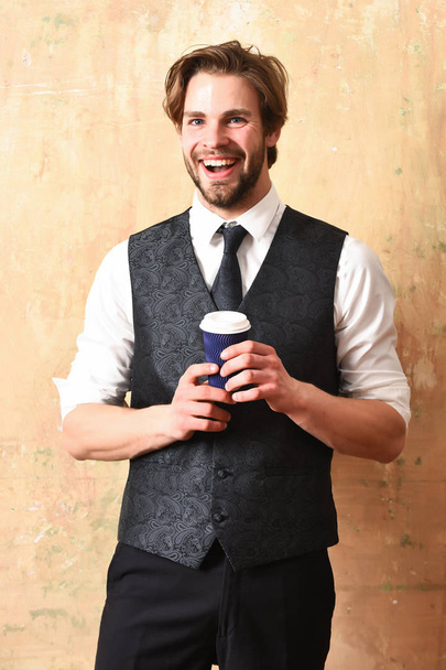coffee paper cup in hand of business man in suit - Foto, Imagem