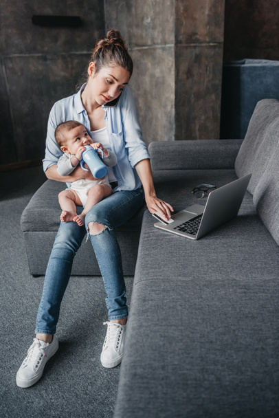 Mother with her son remote working  - Photo, Image