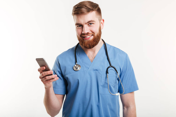 Portrait of doctor with phone - Valokuva, kuva