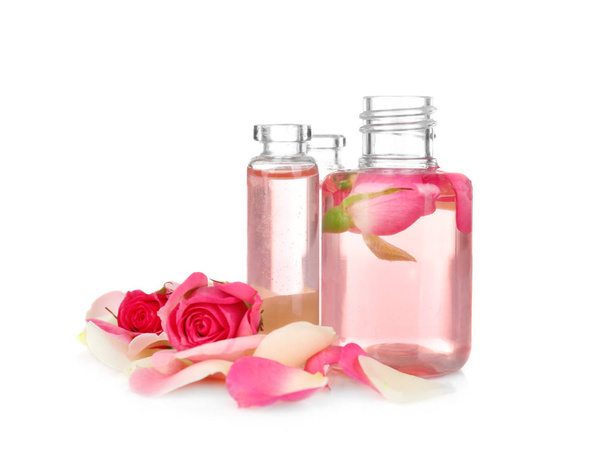  perfume bottles and roses  - Fotografie, Obrázek