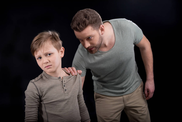 Father and son having conflict - Foto, afbeelding