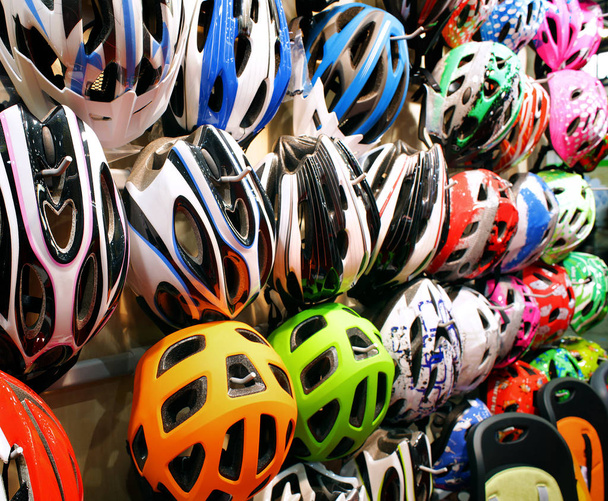 Stand with helmets on bicycle exhibition - Photo, Image