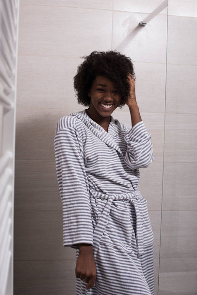beautiful black woman wearing  bathrobe - Valokuva, kuva