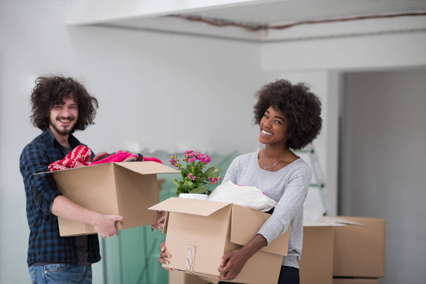 multiethnic couple moving into a new home - Photo, image