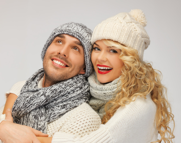 Family couple in a winter clothes - Fotó, kép
