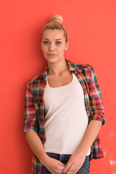 young woman over color background - Фото, изображение