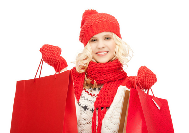 Young girl with shopping bags - Foto, imagen