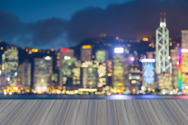 Θολή bokeh φως Χονγκ Κονγκ πόλη στο κέντρο της πόλης, αφηρημένα φόντο - Φωτογραφία, εικόνα