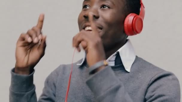 African american man listen music with headphones - Video