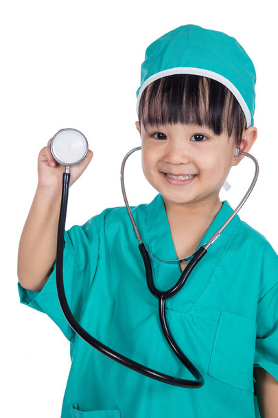 Asian Little Chinese Girl Playing Doctor with a stethoscope - Foto, imagen