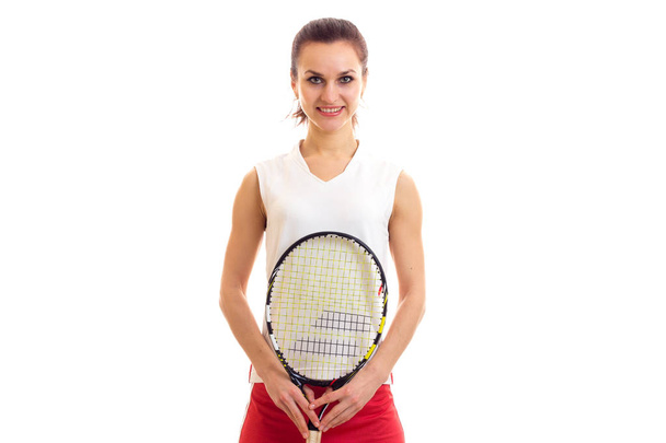 Mujer con raqueta de tenis
 - Foto, imagen