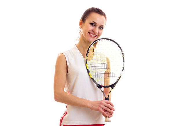 Nainen tennismailan kanssa
 - Valokuva, kuva
