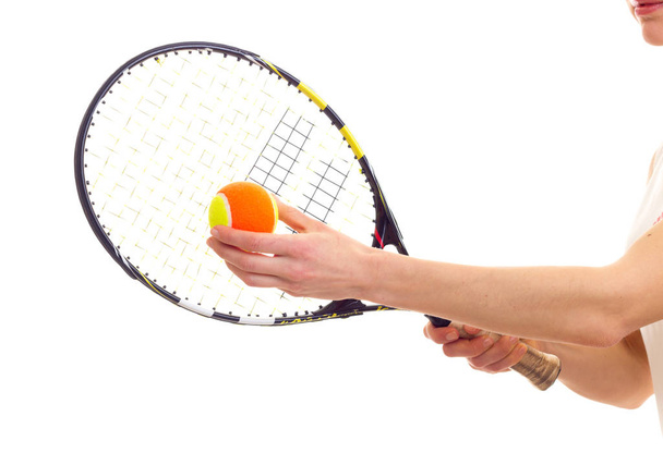 Женщина с теннисной ракеткой и мячом
 - Фото, изображение