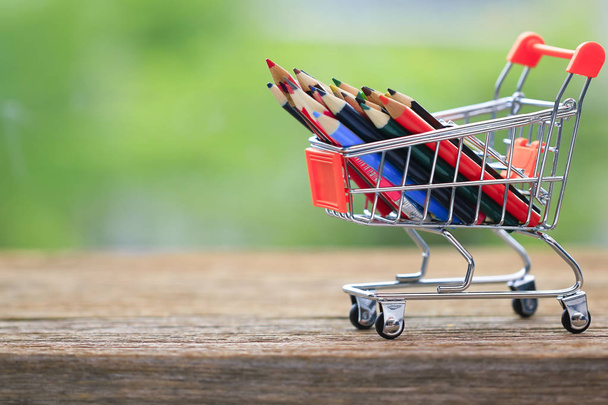 Stock Photo - color pencils in shopping cart. - Φωτογραφία, εικόνα