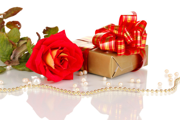 Beautiful red rose with wonderful gift in gold box isolated on white - Foto, Imagem