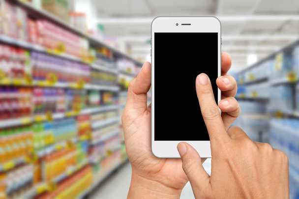 Ruka drží a Touch White smartphone pro online nakupování - Fotografie, Obrázek