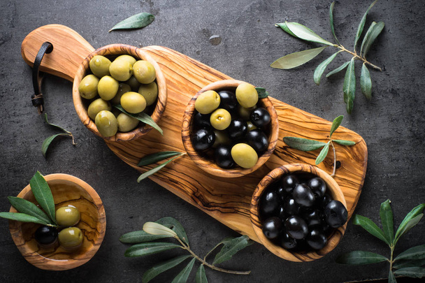 Black and green olives. Top view. - Photo, Image
