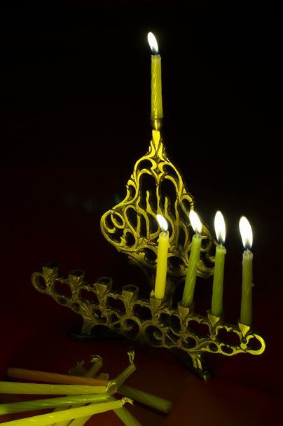Ханука свічки в Хануккії
 - Фото, зображення
