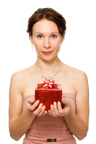 Beautiful woman with a gift in hand - Foto, Imagen