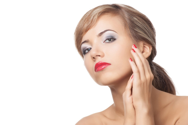 Pretty young woman with red lipstick and manicure - Фото, изображение