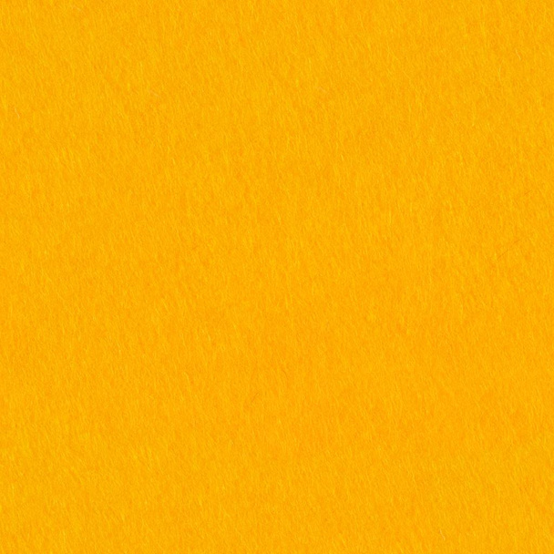 明るいオレンジ色のフェルトの背景。シームレスな正方形テクスチャー、タイル  - 写真・画像