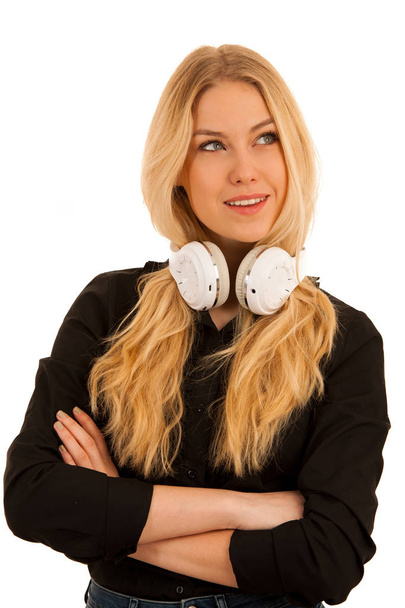 Beautiful young woman listens to the music on headphones and dan - Foto, immagini