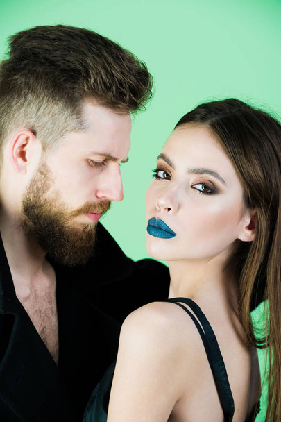 couple of bearded man, woman in black with fashionable makeup - Fotó, kép