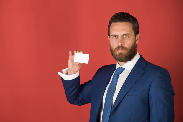 confident businessman with silver business or credit card, business ethics - Fotoğraf, Görsel