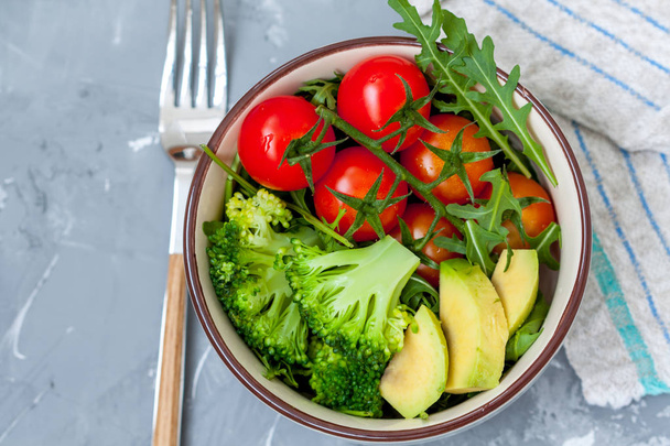bowl with a simple vegetable salad  - Фото, изображение