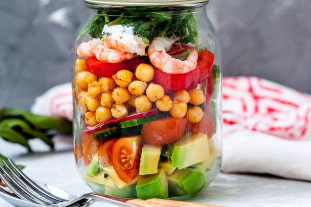 Salad with shrimp and chickpeas in the jar. - Photo, image