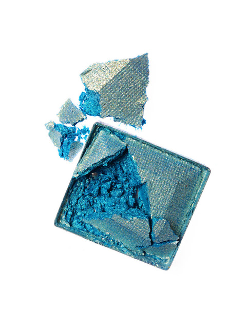 Crushed blue shiny eyeshadow as sample of cosmetic product - Zdjęcie, obraz