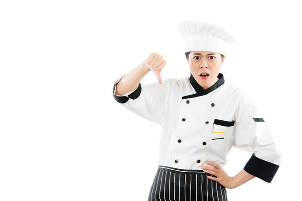woman chef dislike and showing thumb down - Foto, Imagem