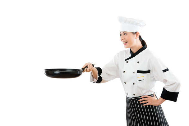 professional asian chef with a flat pan - Photo, image