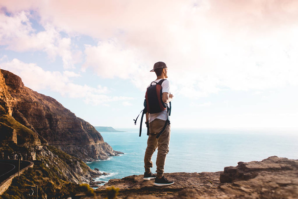  hiker standing on cliff edge - Photo, Image