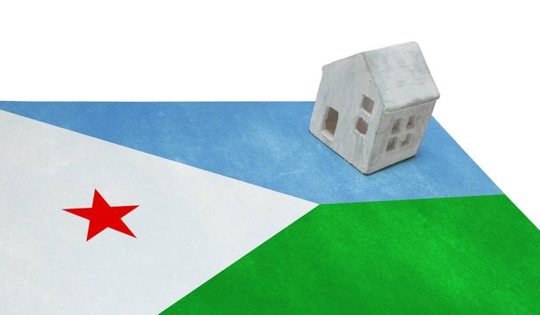 Pequeña casa en una bandera - Djibouti
 - Foto, Imagen