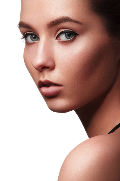 Beautiful Young Woman with Clean Fresh Skin . Cosmetology , beauty and spa . - 写真・画像