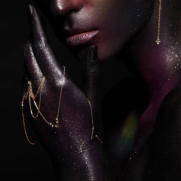Beautiful girl with art space makeup on her face and body. Glitter Face. - Fotoğraf, Görsel