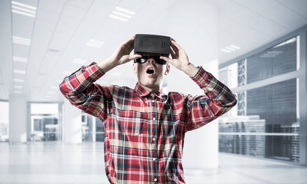 Young man with virtual reality headset - Fotó, kép